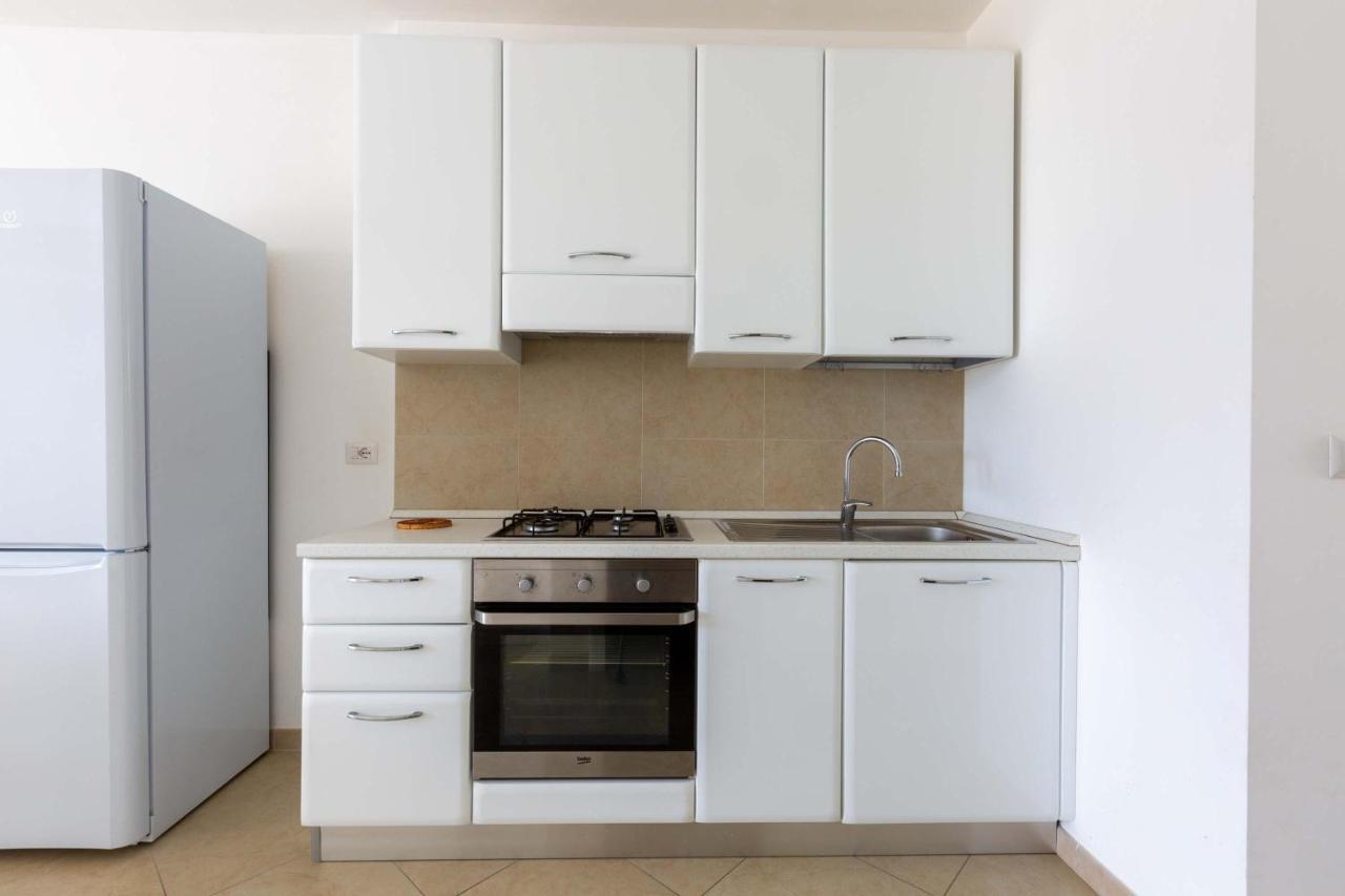 Appartement Trilo Damiani By Barbarhouse à Lido Marini Extérieur photo